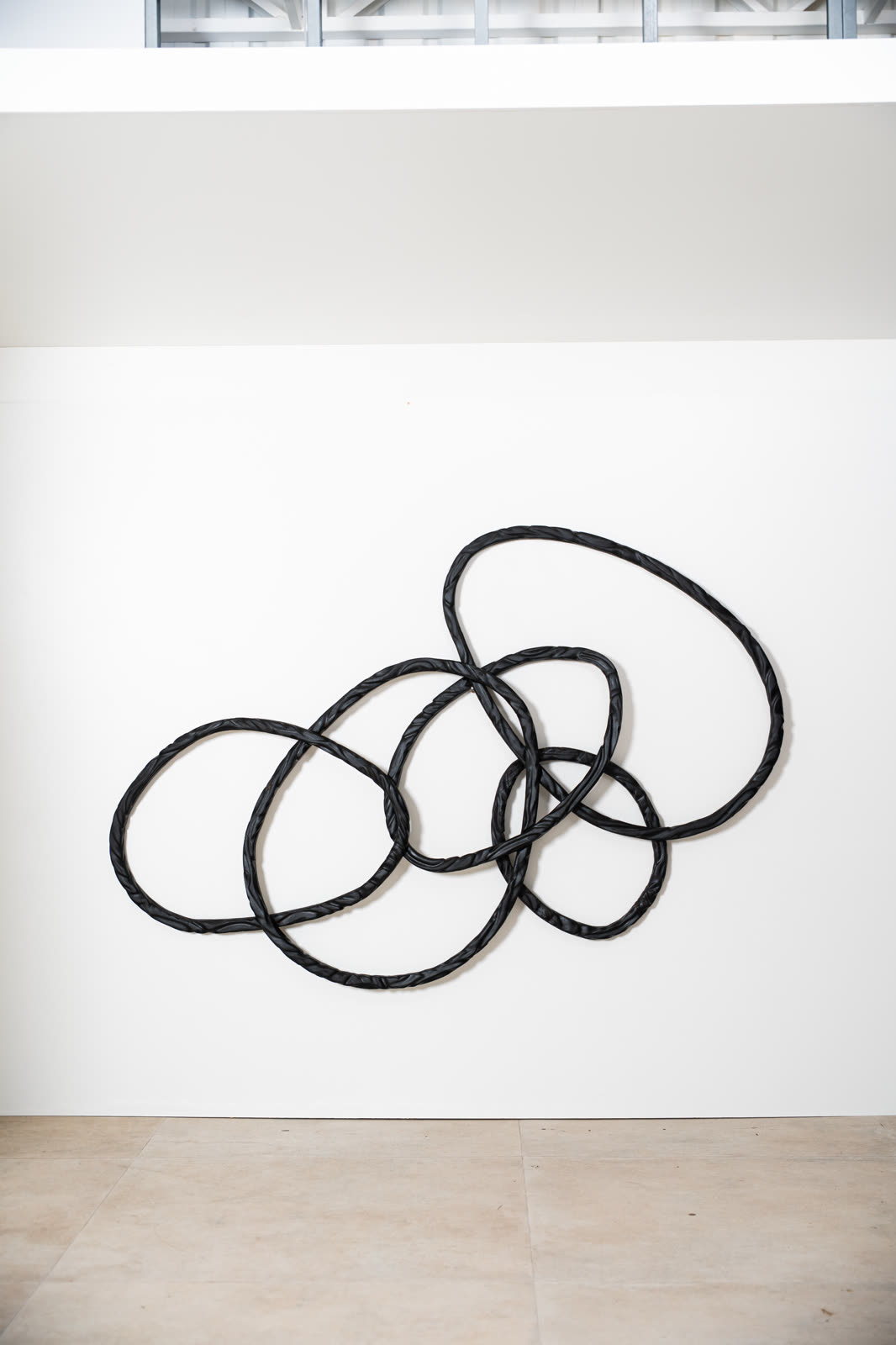 Laços — escultura de parede